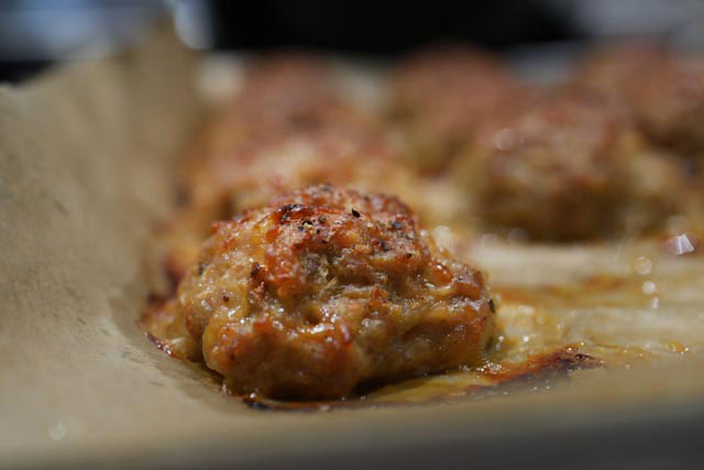 Oven baked turkey meatballs sourdough afterglow recipe a perfectly baked turkey meatball fresh from the ovengolden crispy on the outside and tender on the inside This mouthwatering close up highlights the delicious result of this easy sourdough discard meatball recipe Sourdough afterglow Close-up of a golden, oven-baked turkey meatball with a crispy edge and juicy interior