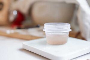 Fine sea salt dissolved in water in a small container for sourdough cinnamon swirl recipe